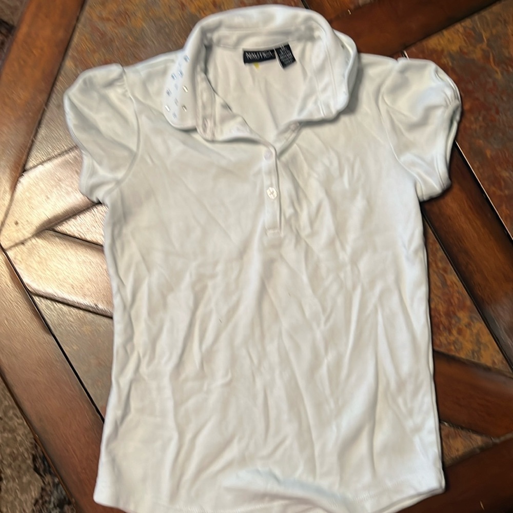 Pale blue polo top. Size 8/10, Nautica